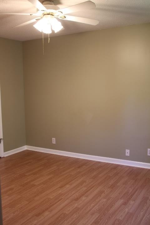 916 Granny White Road Clarksville, TN 37040 - Photo 14 of 19 a view of a small space with wooden floor and a window
