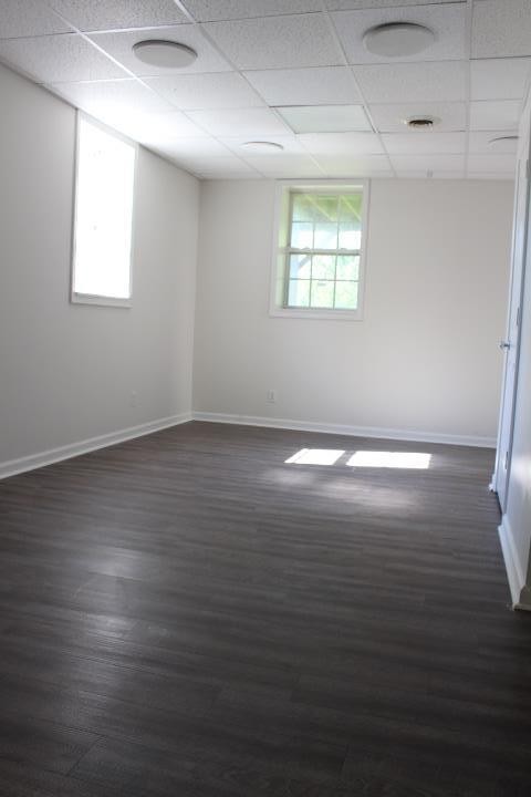 916 Granny White Road Clarksville, TN 37040 - Photo 17 of 19 an empty room with wooden floor and windows
