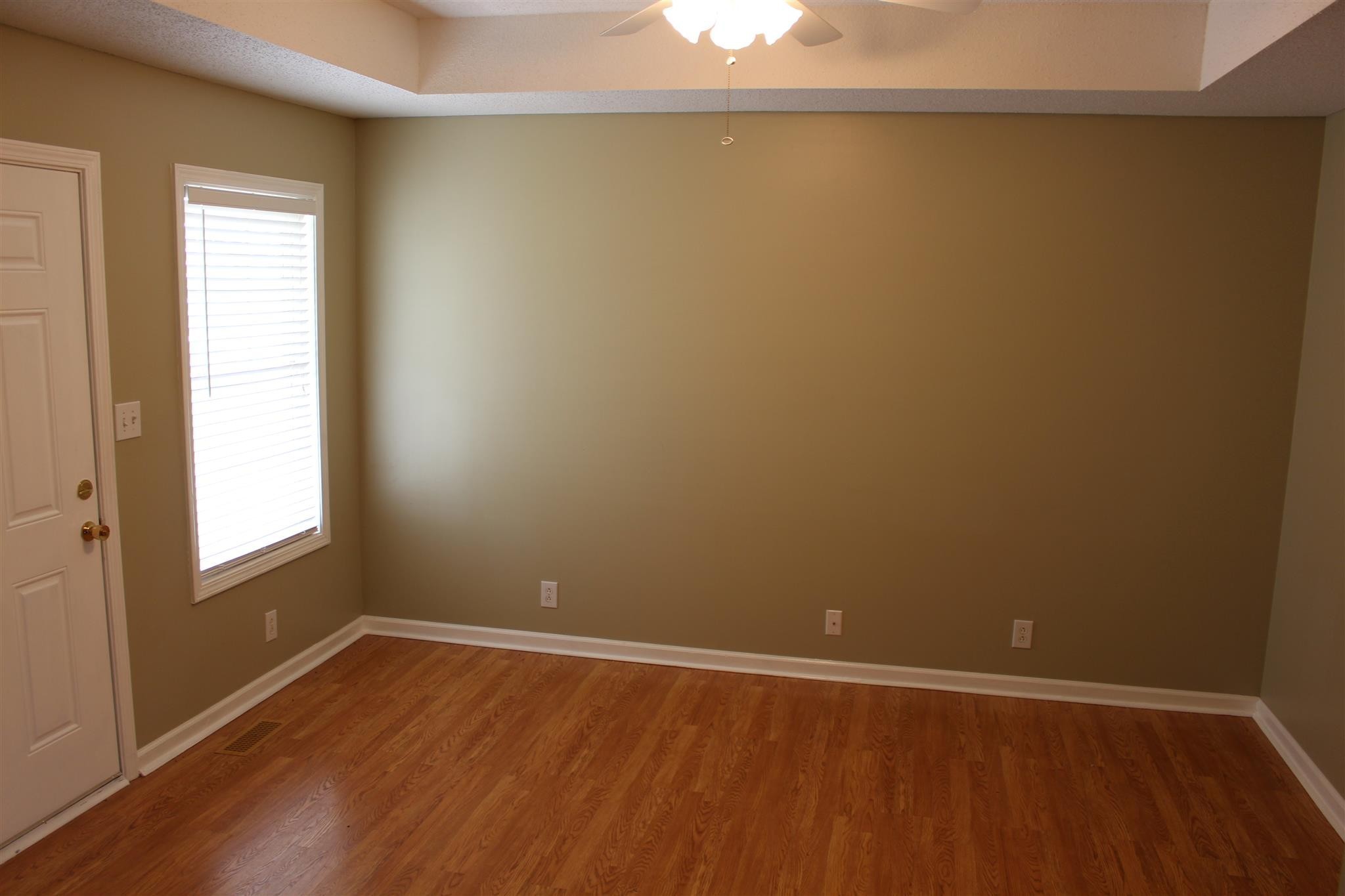 916 Granny White Road Clarksville, TN 37040 - Photo 2 of 19 an empty room with a window