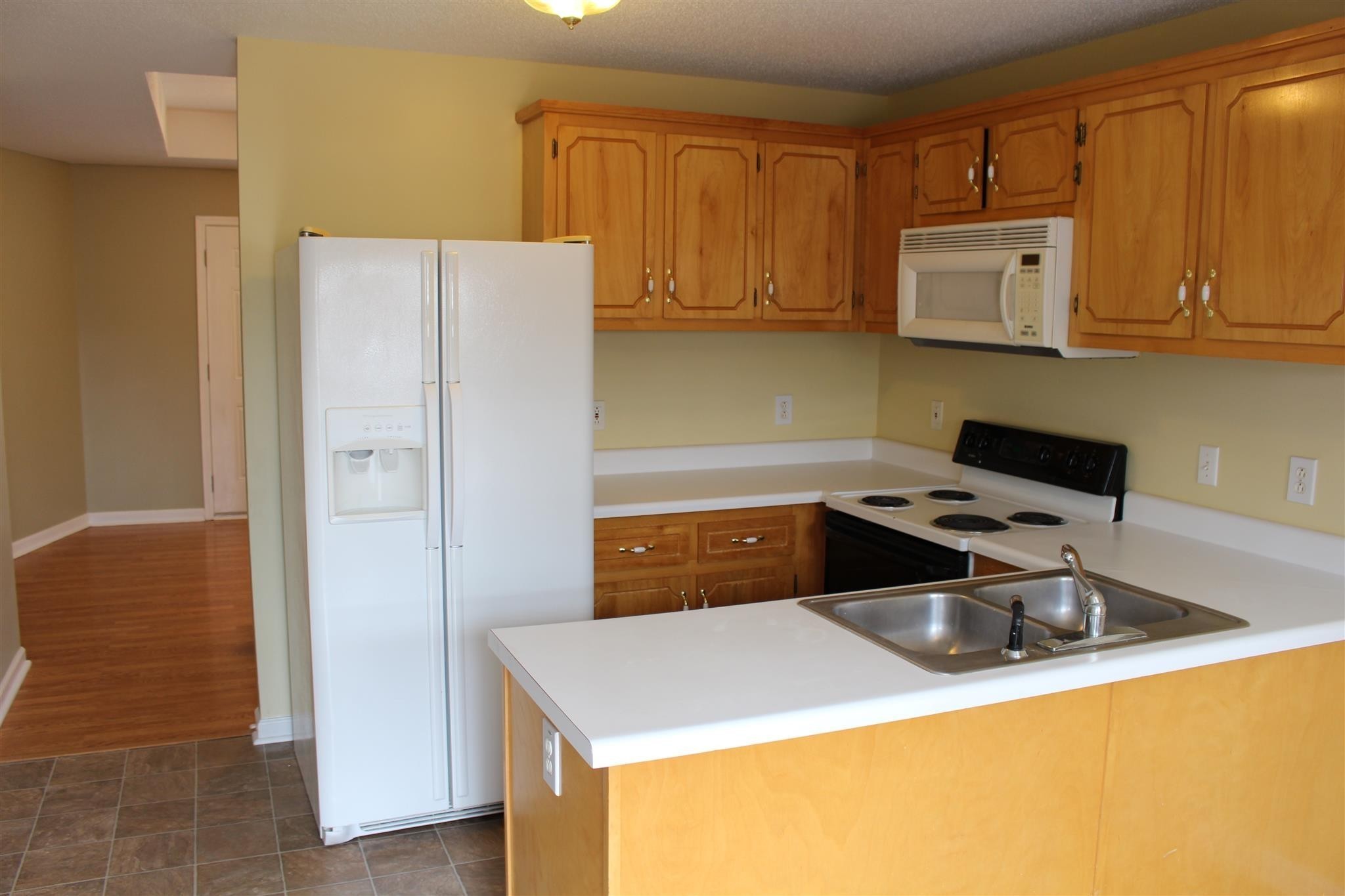 916 Granny White Road Clarksville, TN 37040 - Photo 5 of 19 a kitchen with a sink appliances and cabinets