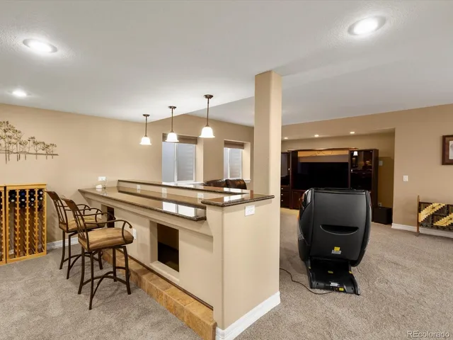 a bathroom with a sink toilet and a mirror