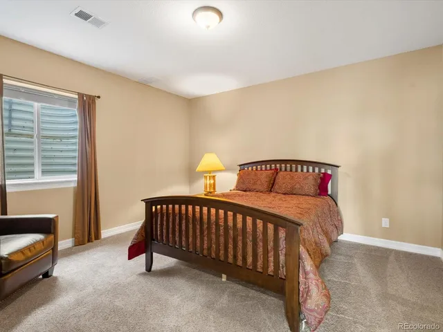 a view of swimming pool in the backyard of house
