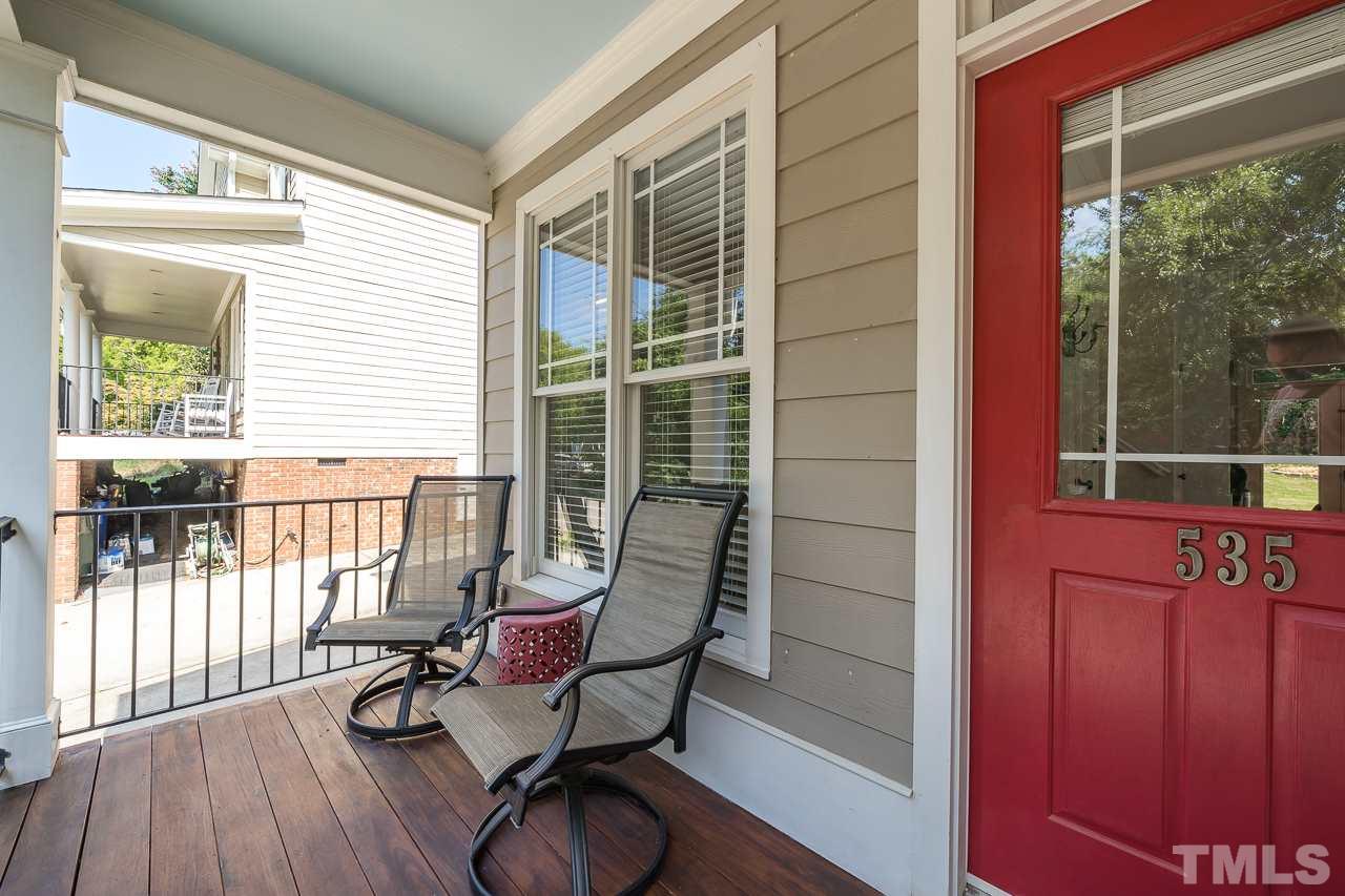 535 Pace Street Raleigh, NC 27604 - Photo 2 of 25 a balcony with wooden floor and furniture