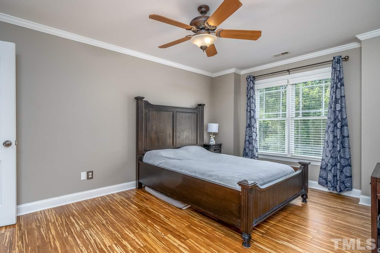 535 Pace Street Raleigh, NC 27604 - Photo 13 of 25 a bedroom with a bed and a window