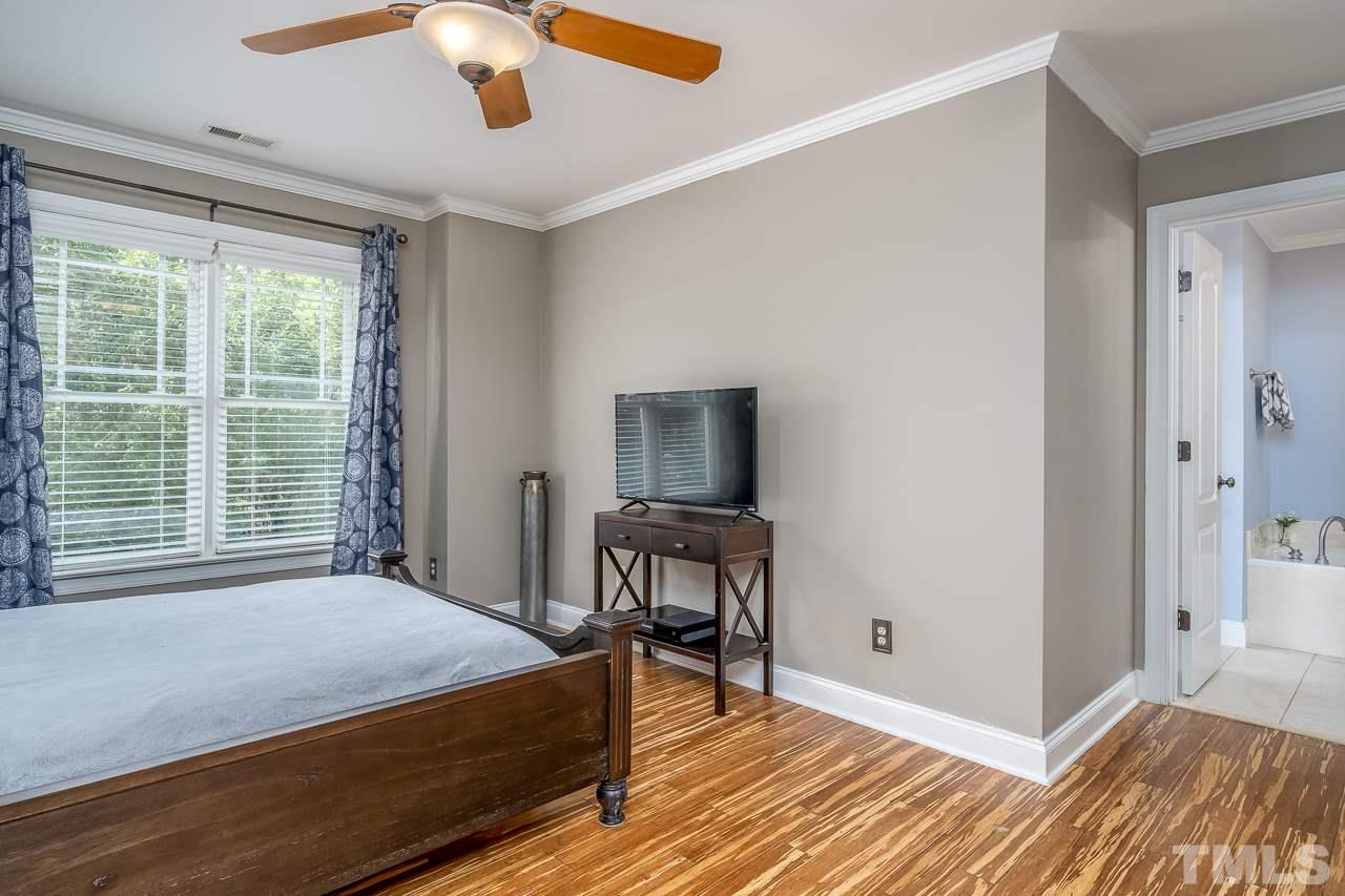535 Pace Street Raleigh, NC 27604 - Photo 14 of 25 a bedroom with a bed and a window