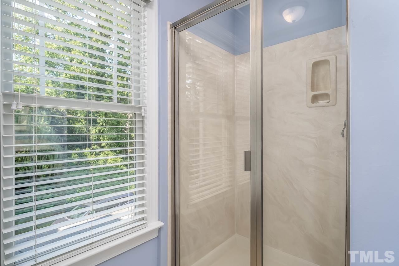 535 Pace Street Raleigh, NC 27604 - Photo 16 of 25 a bathroom with a shower and a sink