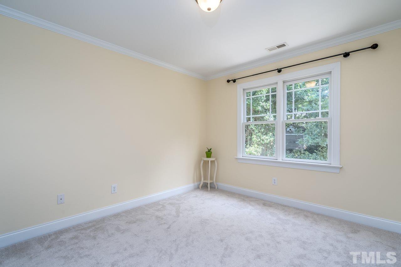 535 Pace Street Raleigh, NC 27604 - Photo 17 of 25 an empty room with windows
