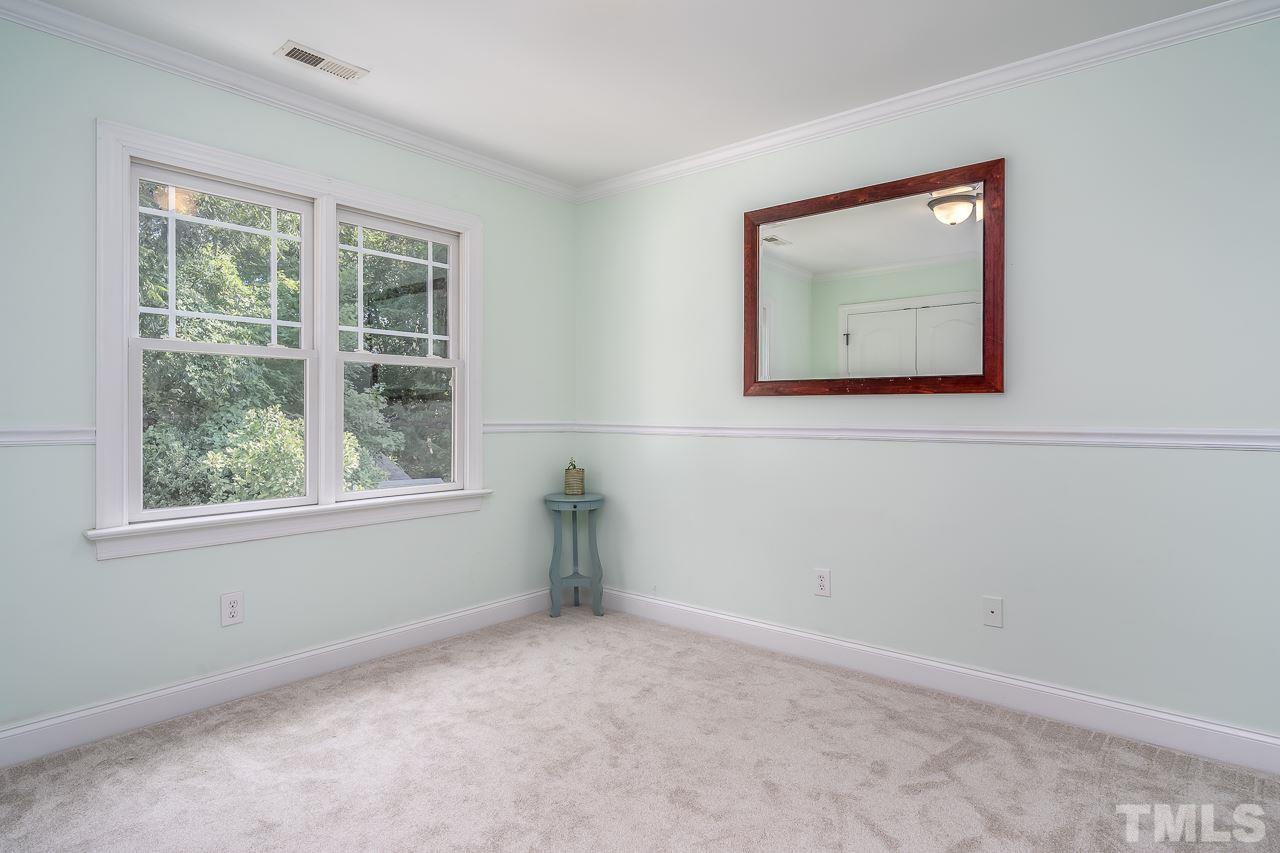 535 Pace Street Raleigh, NC 27604 - Photo 18 of 25 an empty room with a window