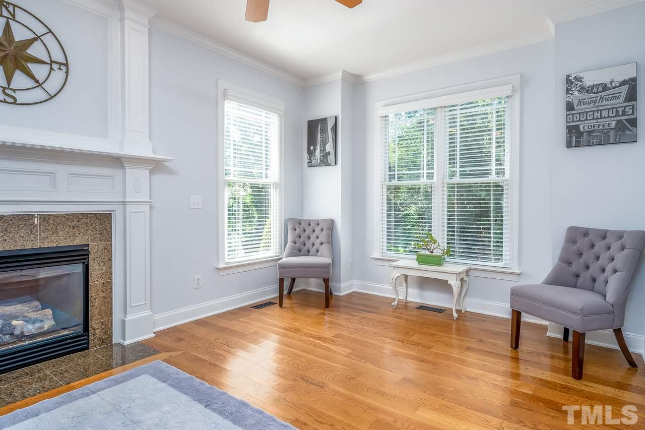 535 Pace Street Raleigh, NC 27604 - Photo 5 of 25 a living room with furniture and a fireplace