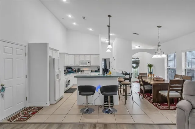 a bathroom with a sink a vanity and a mirror