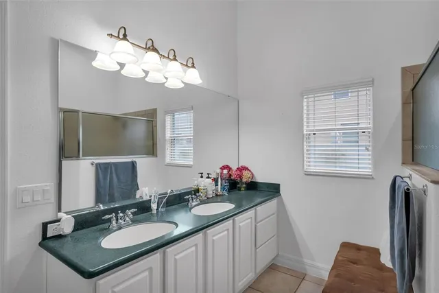 an aerial view of a house with a garden