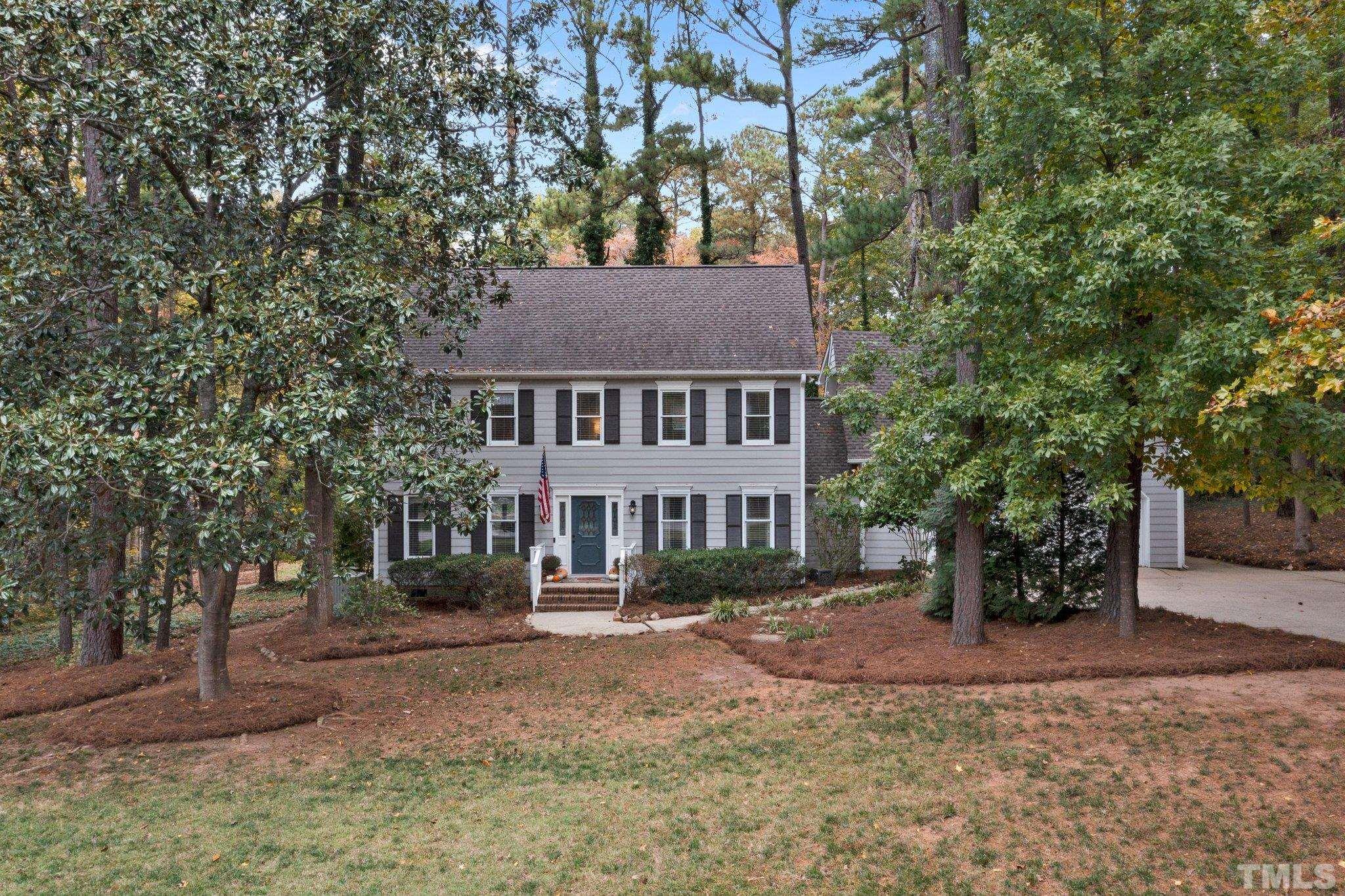 8709 Langtree Lane Raleigh, NC 27613 - Photo 2 of 49 a view of house with a outdoor space