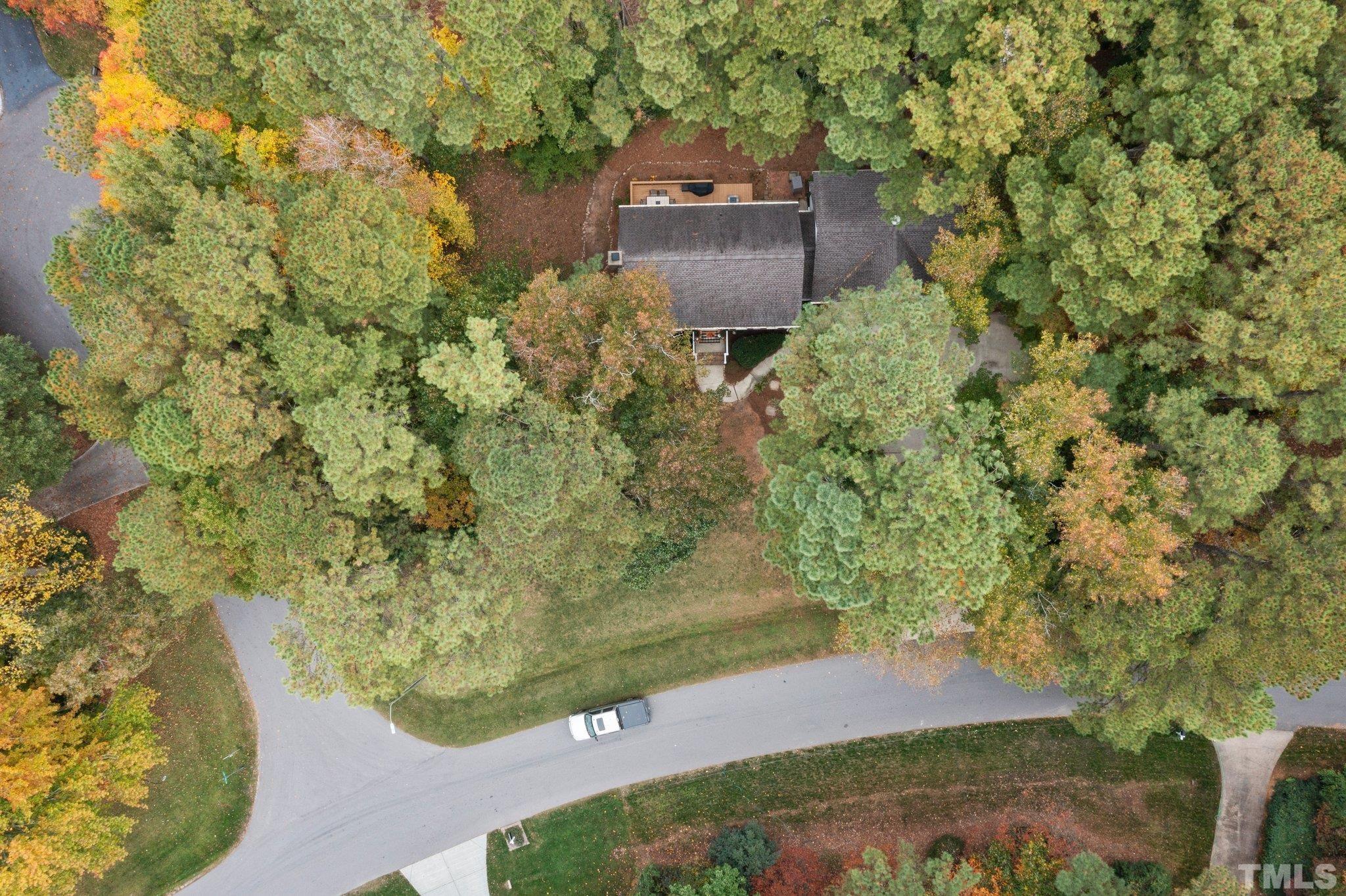 8709 Langtree Lane Raleigh, NC 27613 - Photo 42 of 49 a view of a back yard of a house