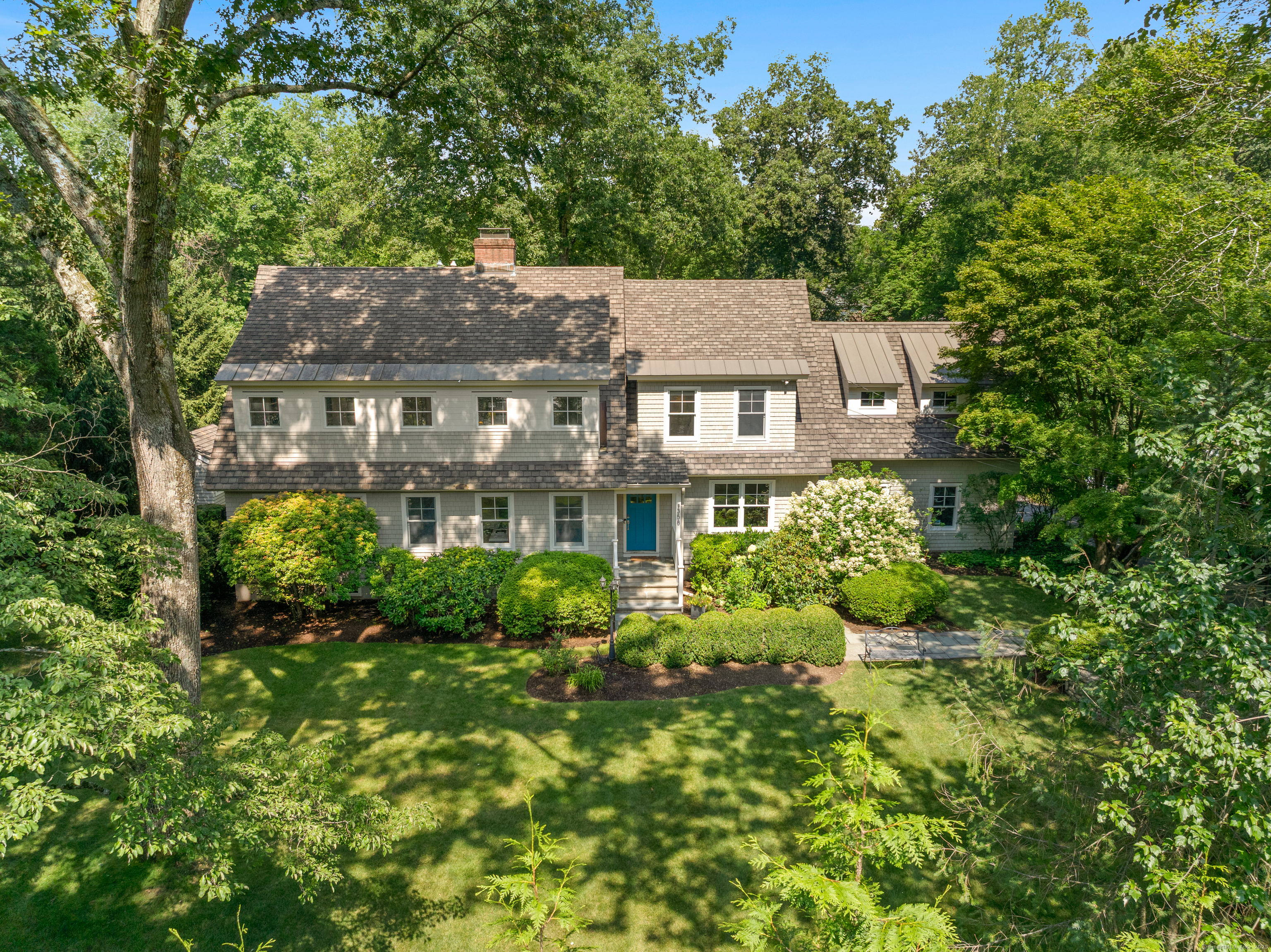 front view of a house with a yard