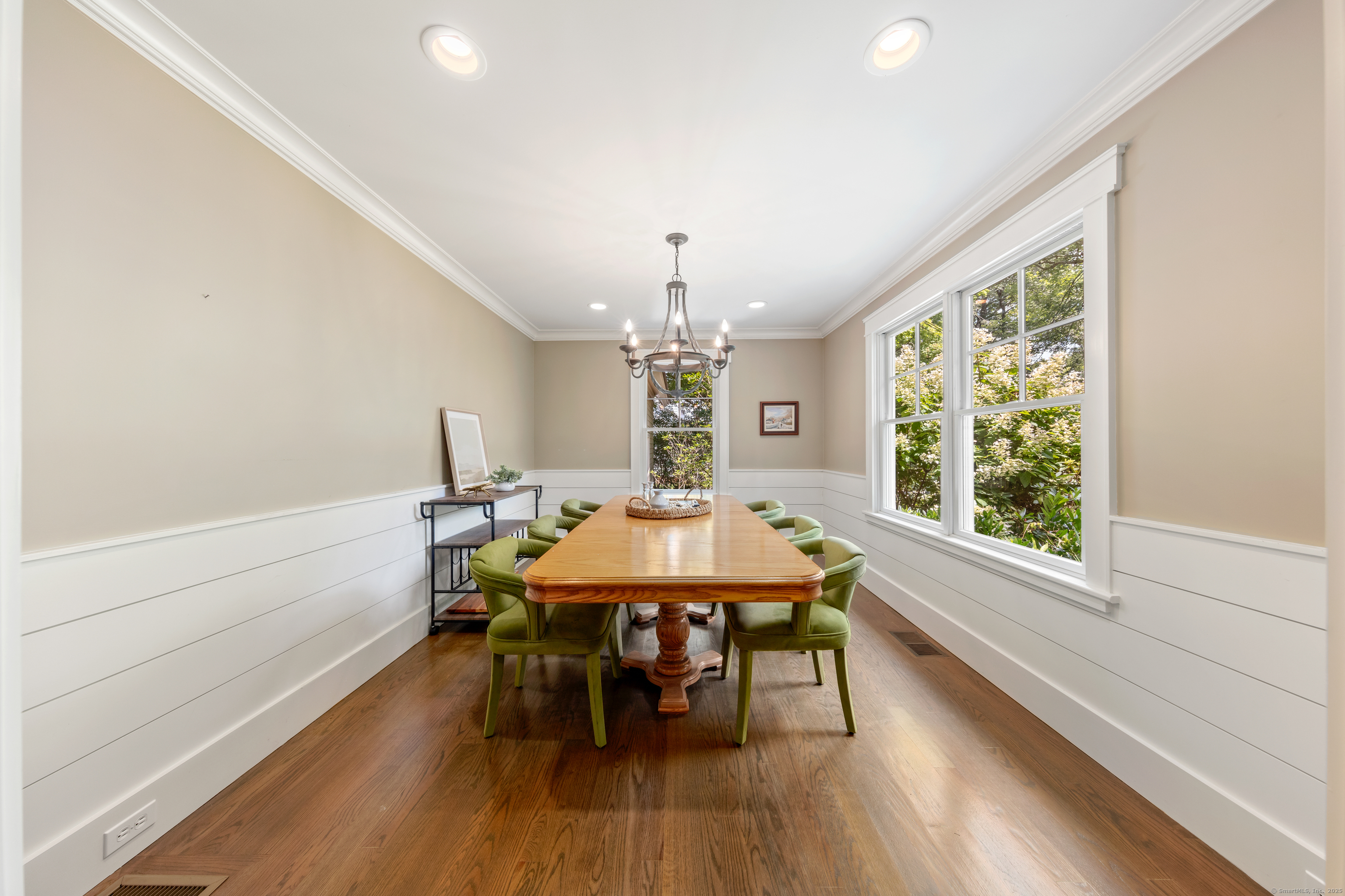 358 Hoyt Street Darien, CT 06820 - Photo 12 of 40 a view of a dining room with furniture window and wooden floor