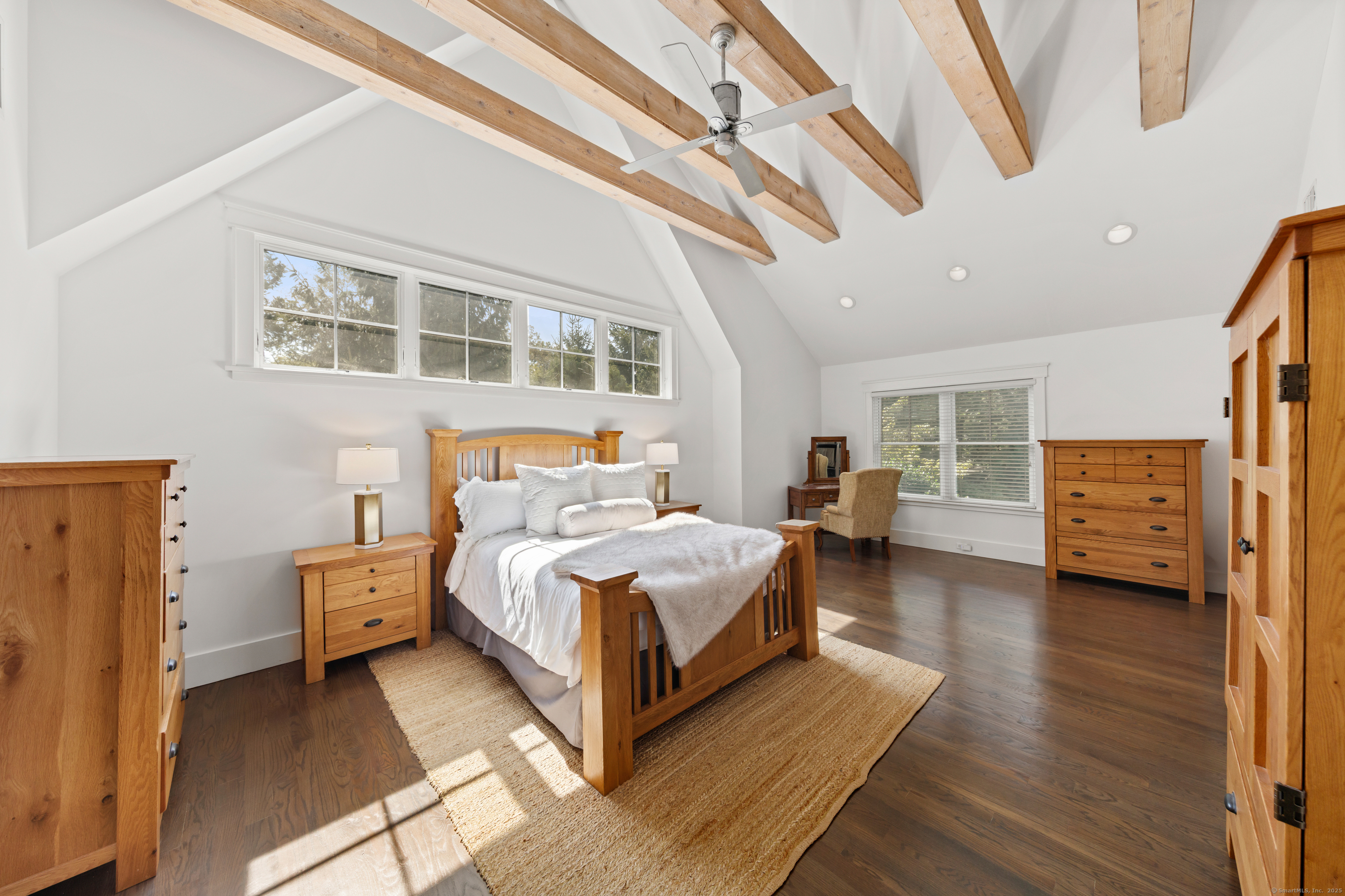 358 Hoyt Street Darien, CT 06820 - Photo 24 of 40 a bedroom with furniture and a large window