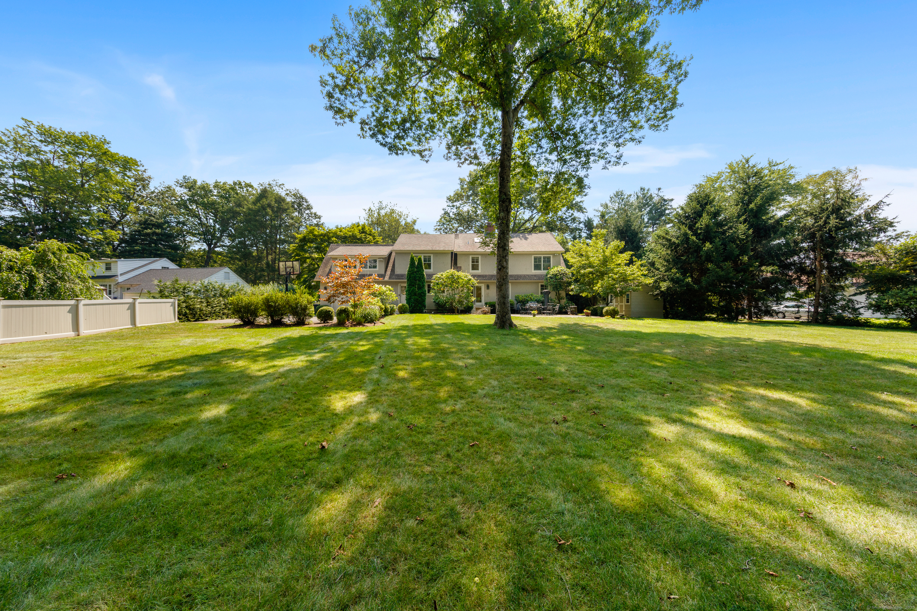 358 Hoyt Street Darien, CT 06820 - Photo 40 of 40 a view of a house with a big yard