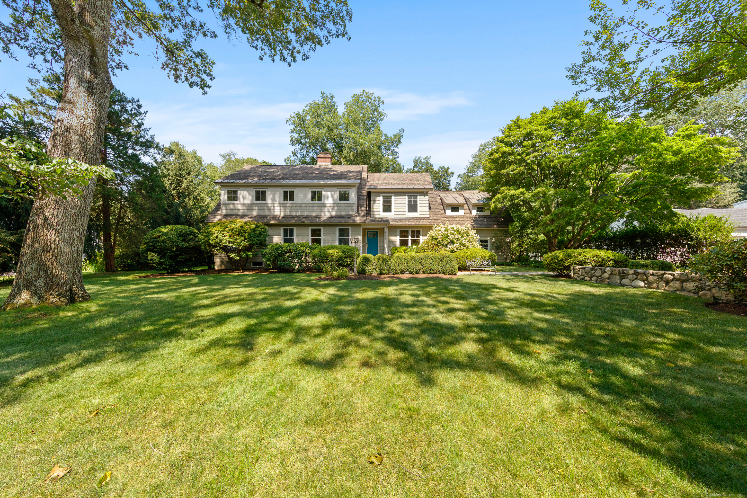 358 Hoyt Street Darien, CT 06820 - Photo 5 of 40 a view of a house with a big yard