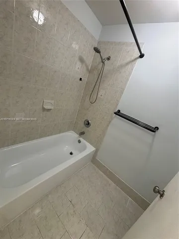 a bathroom with a bathtub