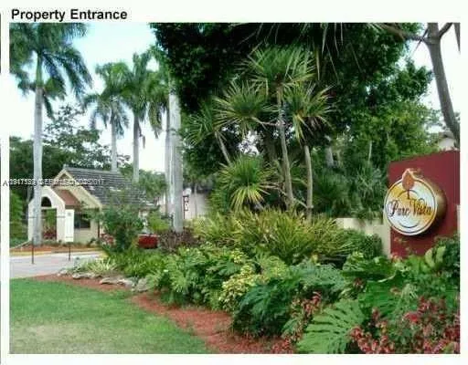 a view of a house with a garden