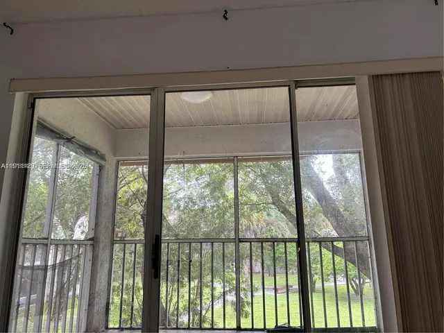a view of a glass door with a glass windows
