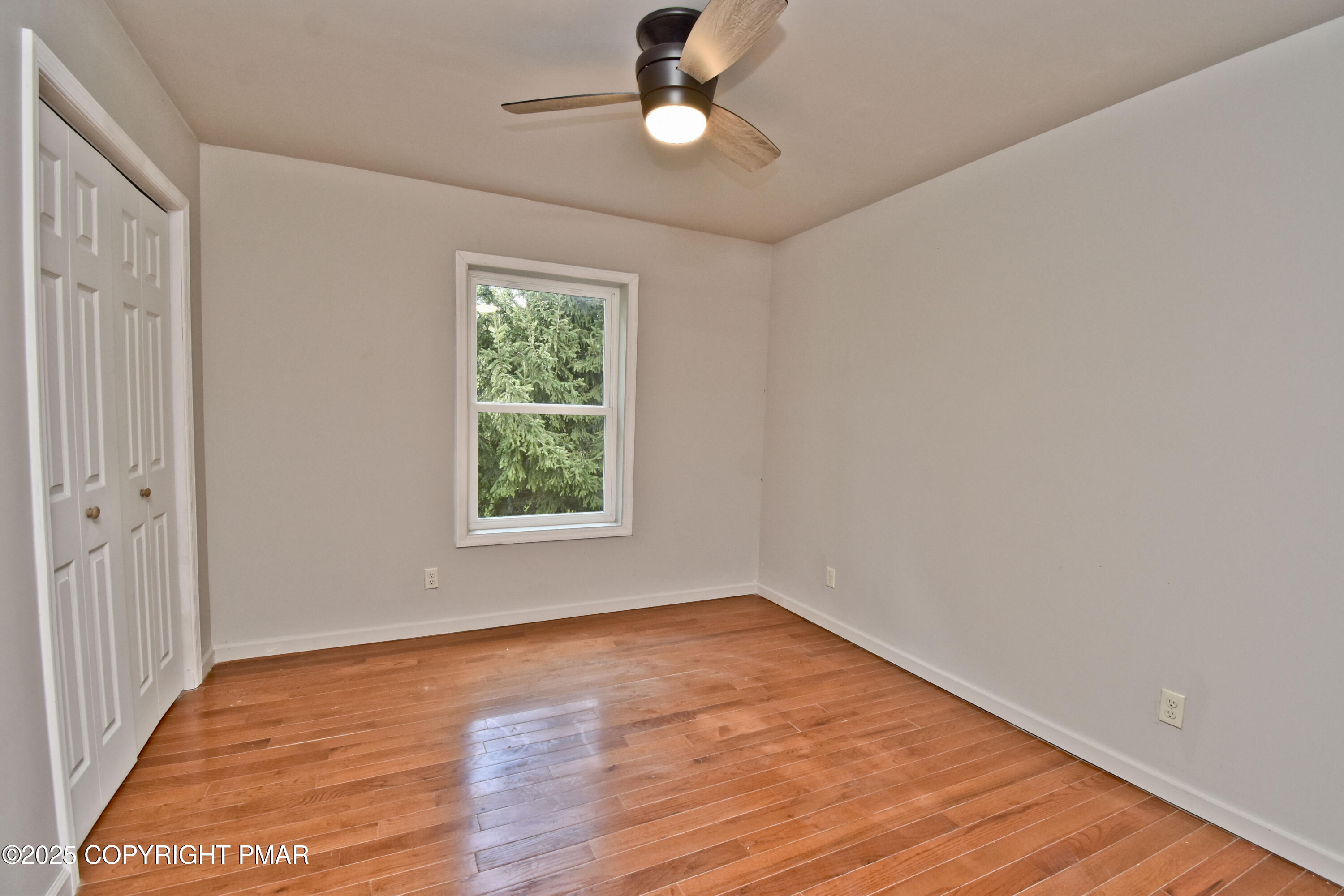 348 Summit Road Swiftwater, PA 18370 - Photo 22 of 47 wooden floor in an empty room with a window