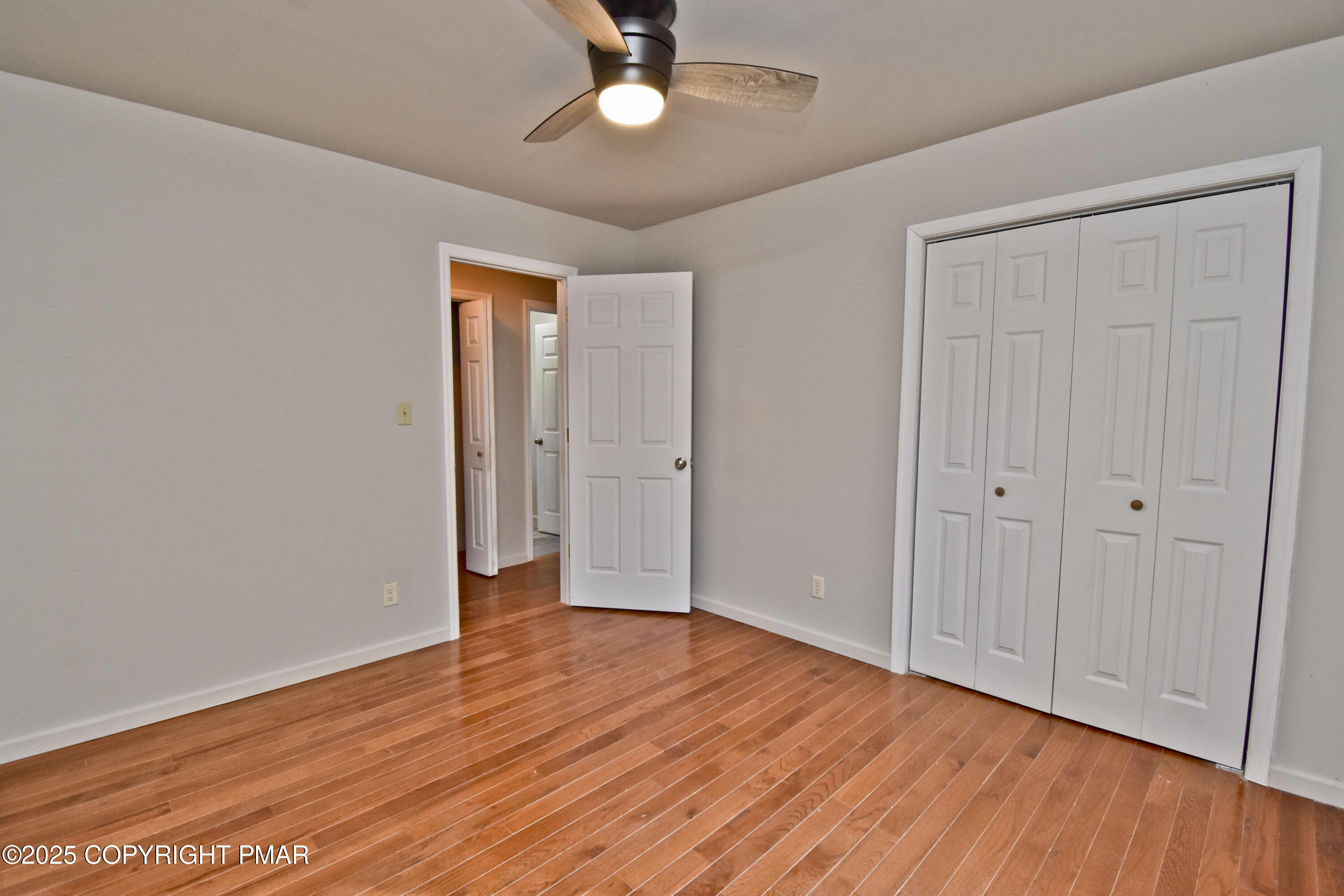 348 Summit Road Swiftwater, PA 18370 - Photo 23 of 47 wooden floor in an empty room with a window