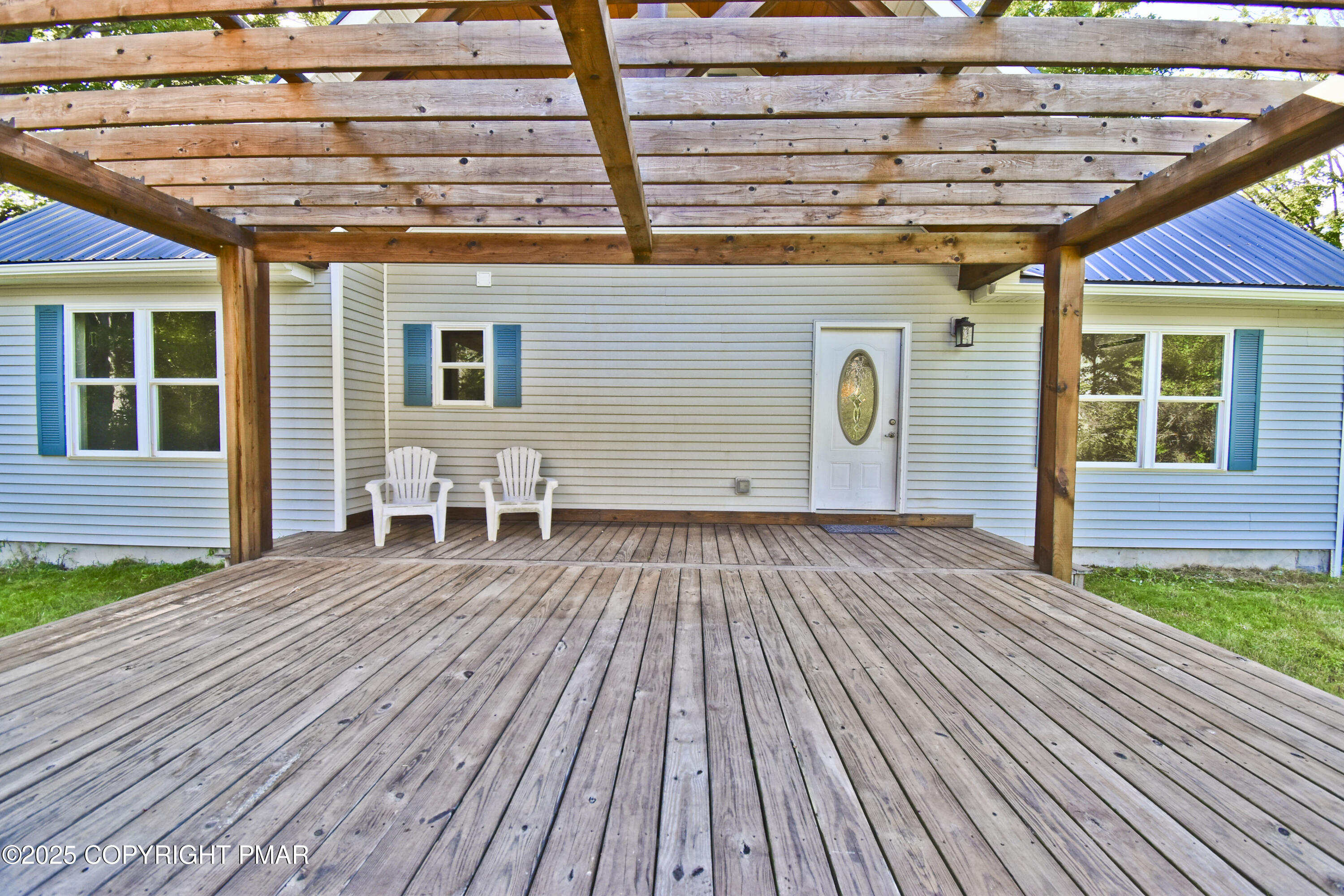 348 Summit Road Swiftwater, PA 18370 - Photo 39 of 47 a view of a patio with wooden floor