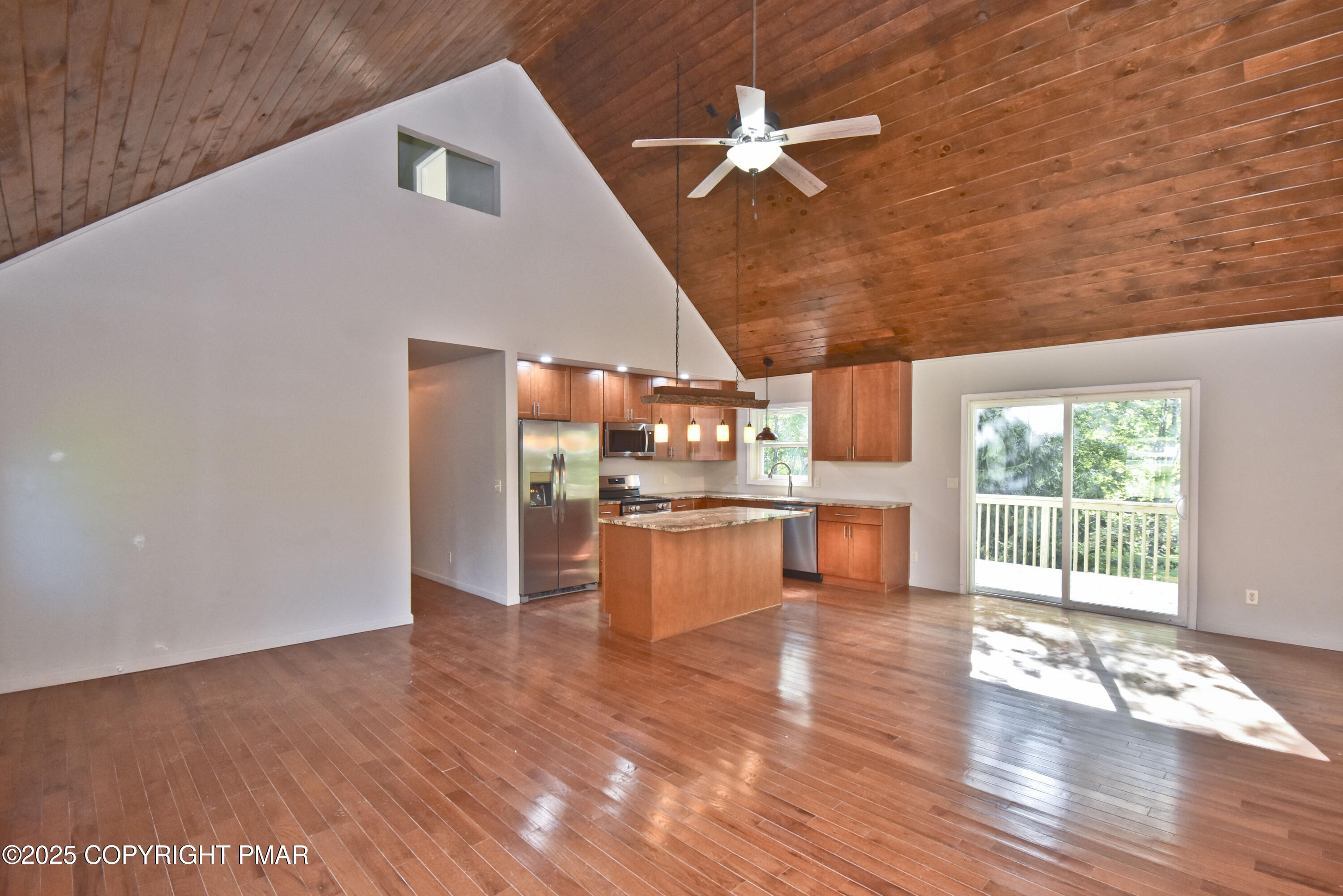 348 Summit Road Swiftwater, PA 18370 - Photo 7 of 47 a view of open kitchen with wooden floor
