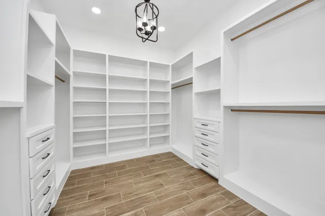 a view of a room with cabinets and window