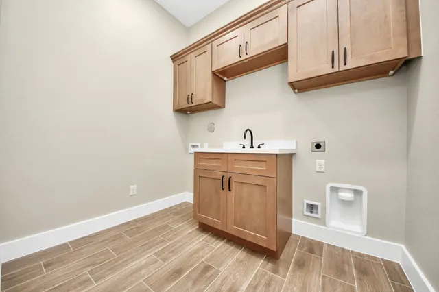 a view of cabinets with wooden floor