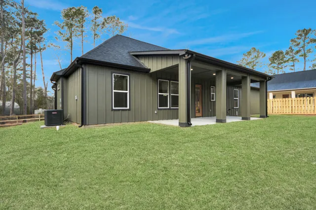 a house with garden in front of it