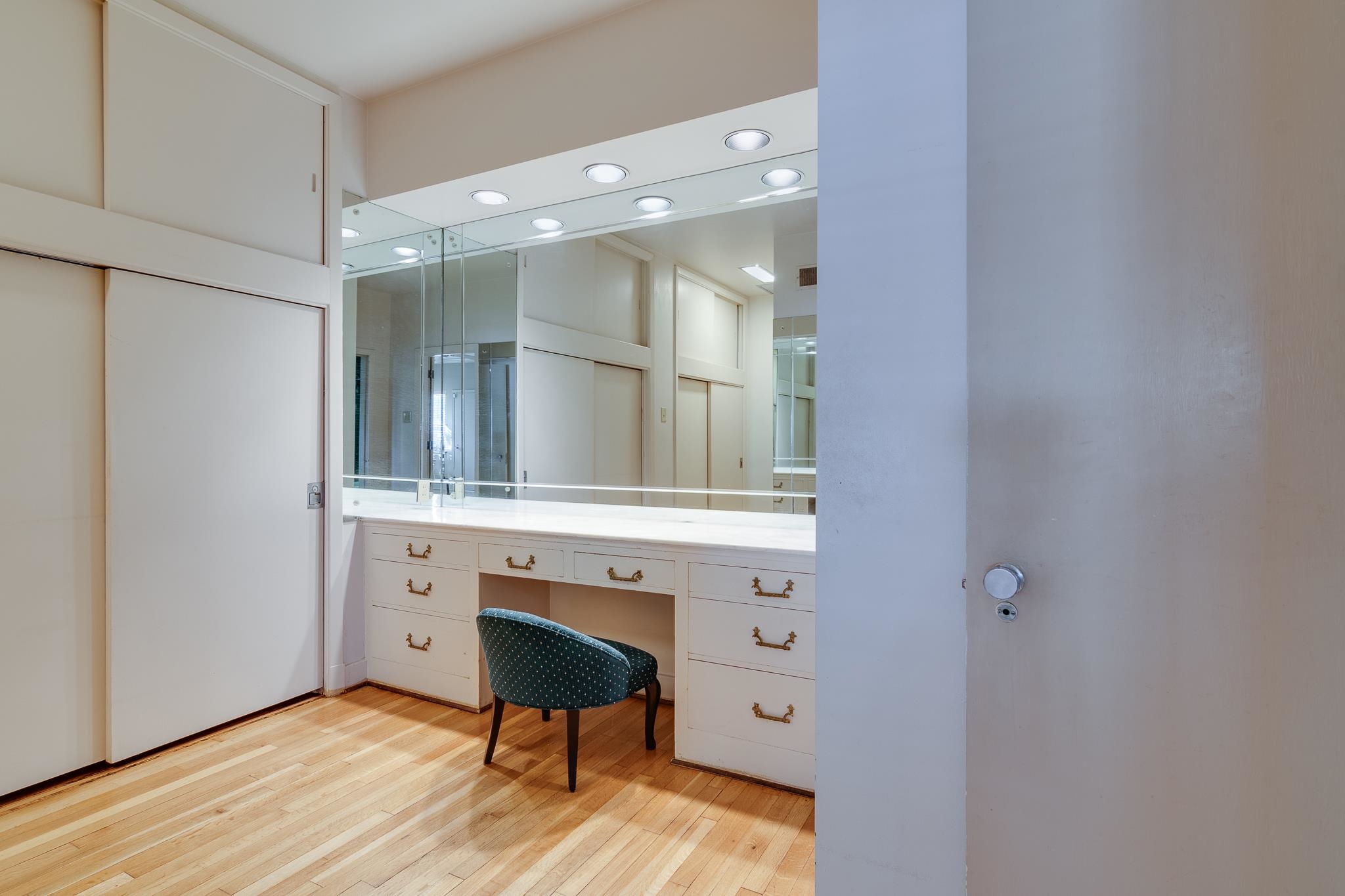 2929 Central Avenue Memphis, TN 38111 - Photo 12 of 25 a bathroom with a sink a mirror and a window