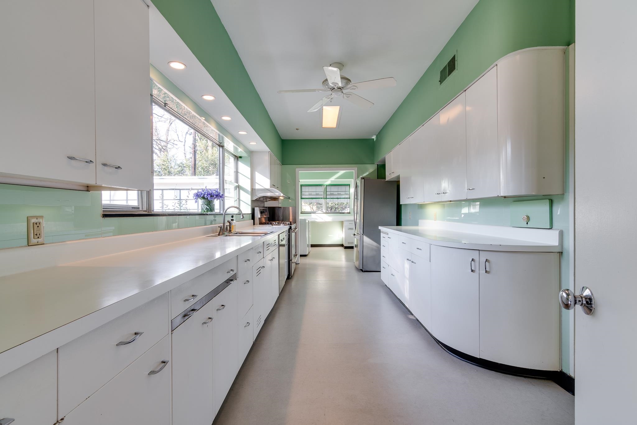 2929 Central Avenue Memphis, TN 38111 - Photo 7 of 25 a large white kitchen with a large window