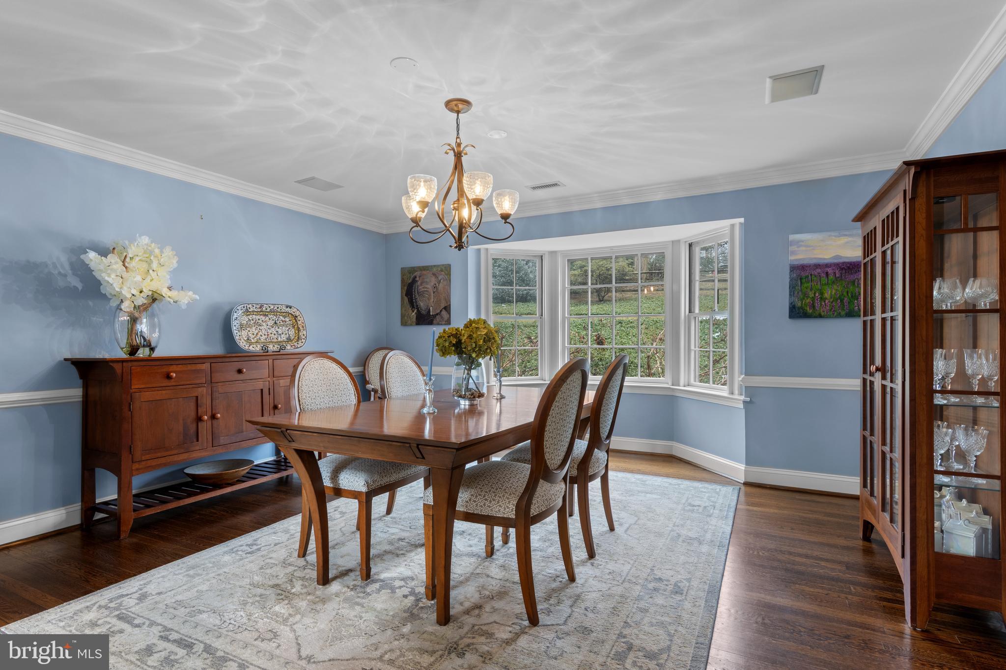 152 Hunters Lane Devon, PA 19333 - Photo 19 of 57 Formal Dining Room with wood floors & bay window
