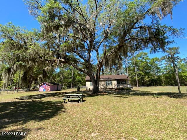 39 State Rd S-7-161 St. Helena Island, SC 29920 - Photo 2 of 28 Front