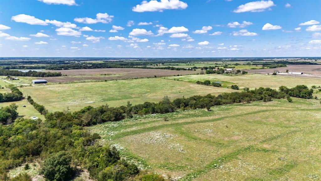 0 County Road 2125 Cooper, TX 75432 - Photo 13 of 17 a view of an ocean and a yard
