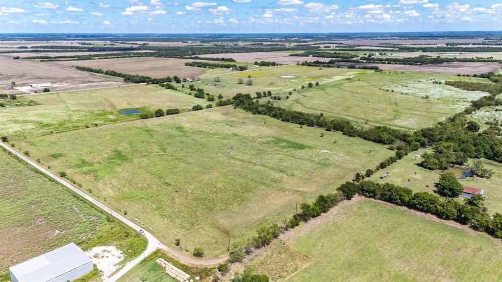 0 County Road 2125 Cooper, TX 75432 - Photo 2 of 17 a view of a swimming pool and an outdoor seating