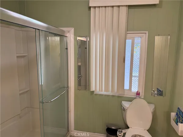 a view of washer and dryer with kitchen appliances