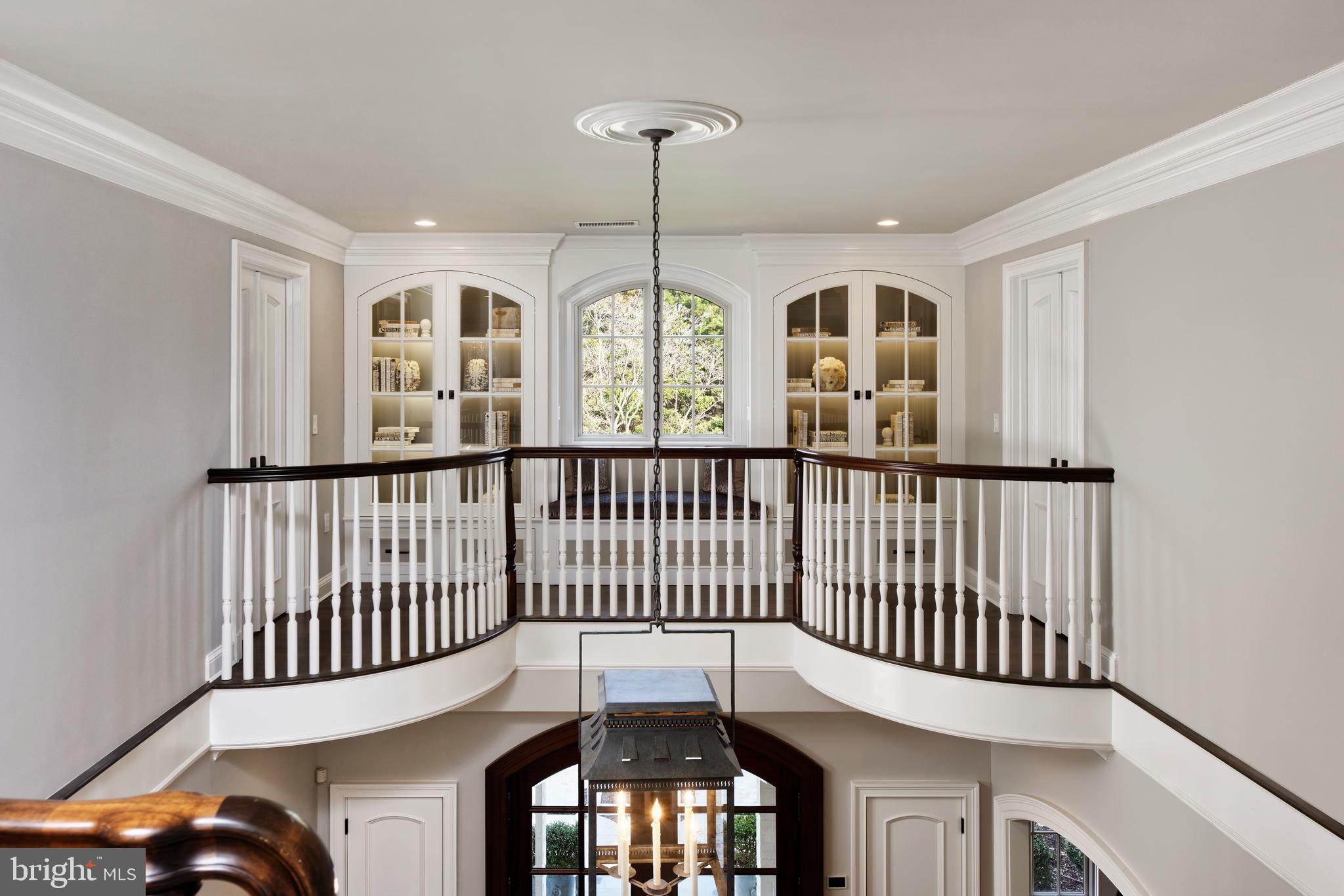 1231 Tottenham Court Reston, VA 20194 - Photo 25 of 86 Sky bridge over foyer w/ custom display cabinetry