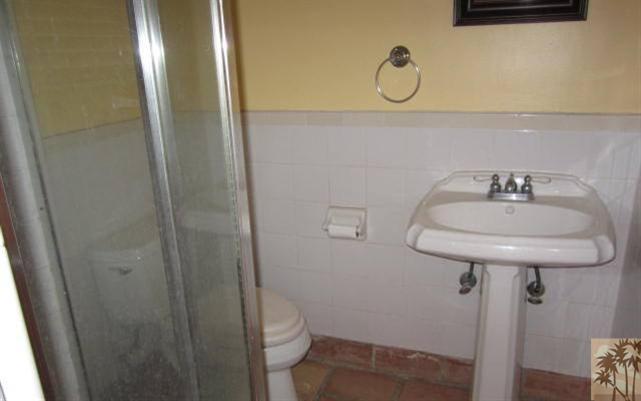 70160 Chappel Road Rancho Mirage, CA 92270 - Photo 7 of 11 a bathroom with a sink toilet and shower