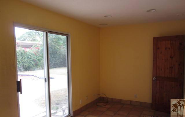 70160 Chappel Road Rancho Mirage, CA 92270 - Photo 10 of 11 a view of a small space with wooden floor and a window