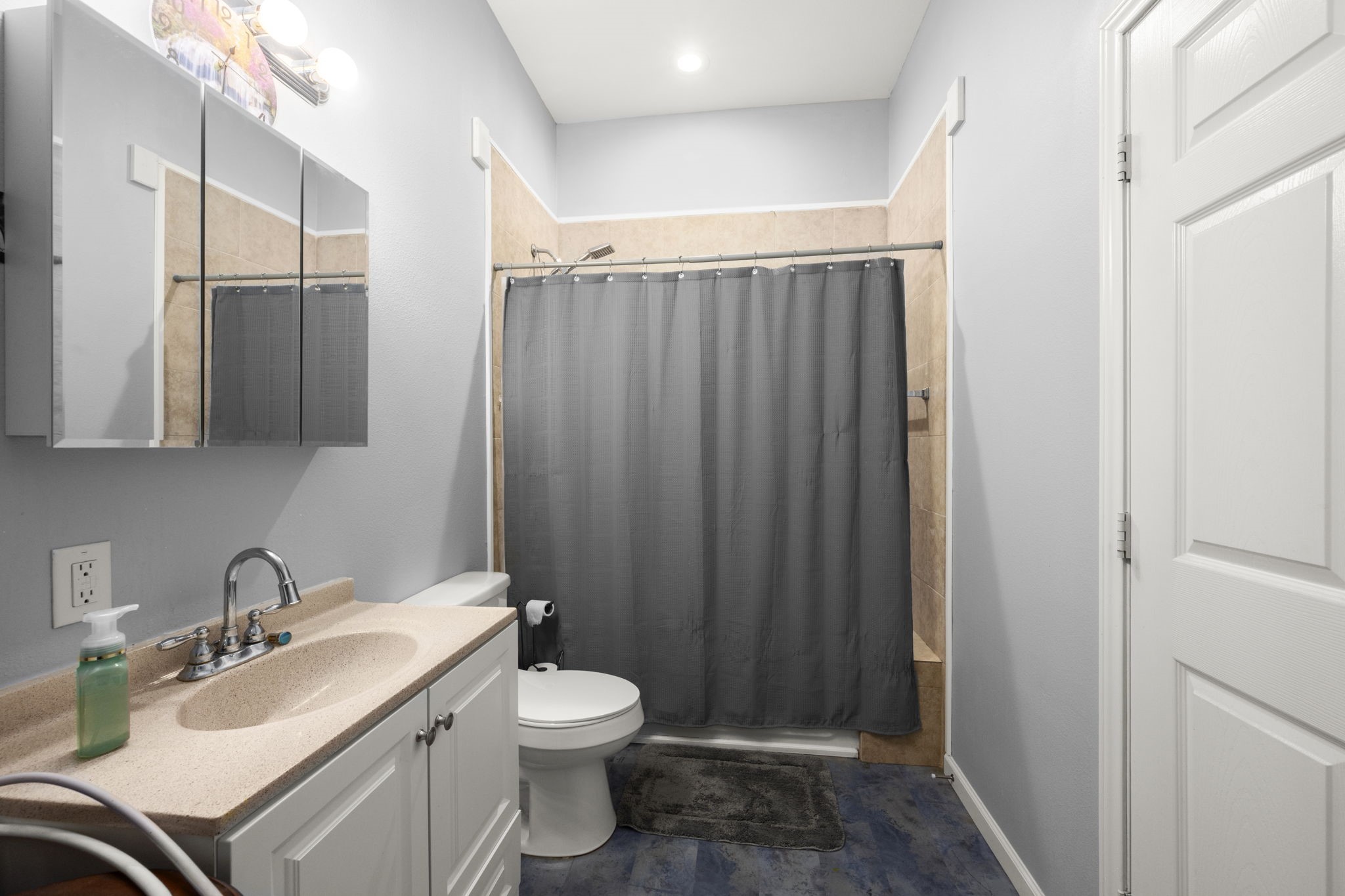 10871 Coaster Lane Conroe, TX 77306 - Photo 11 of 37 Very spacious primary bath, tub/ shower and lots of storage behind where you are standing in this picture.