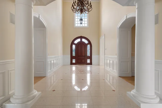 a view of a hallway with windows