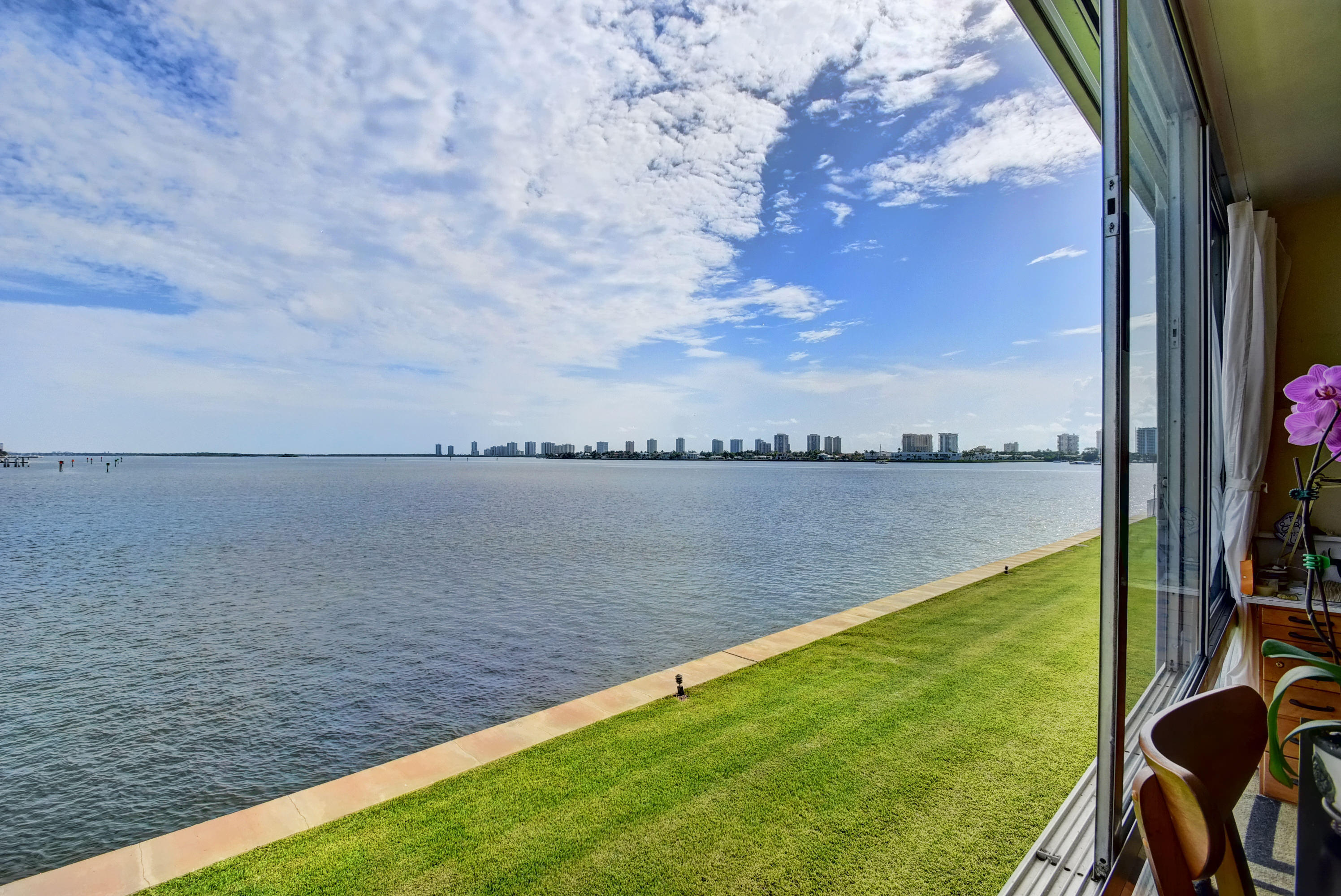 400 Wilma Circle, Unit 202 Riviera Beach, FL 33404 - Photo 13 of 26 Easterly Views from Sun Room