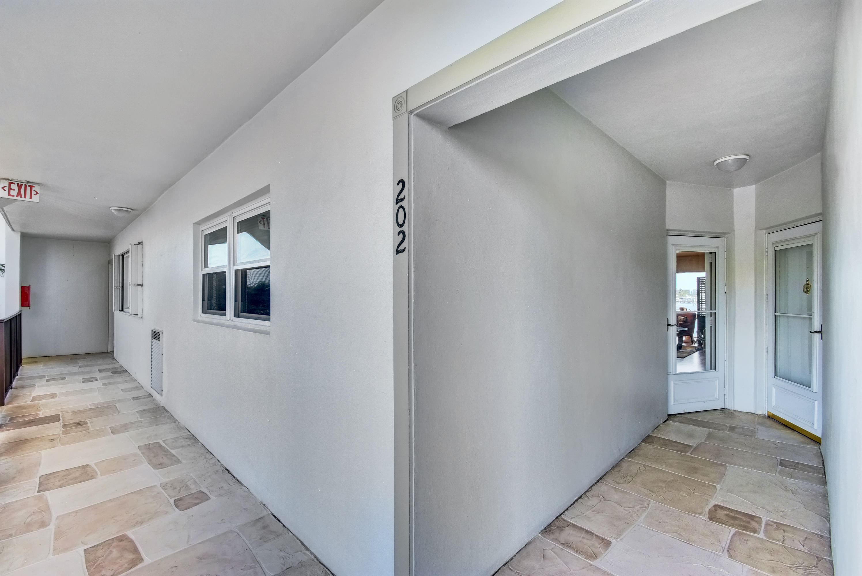 400 Wilma Circle, Unit 202 Riviera Beach, FL 33404 - Photo 4 of 26 FRONT DOOR