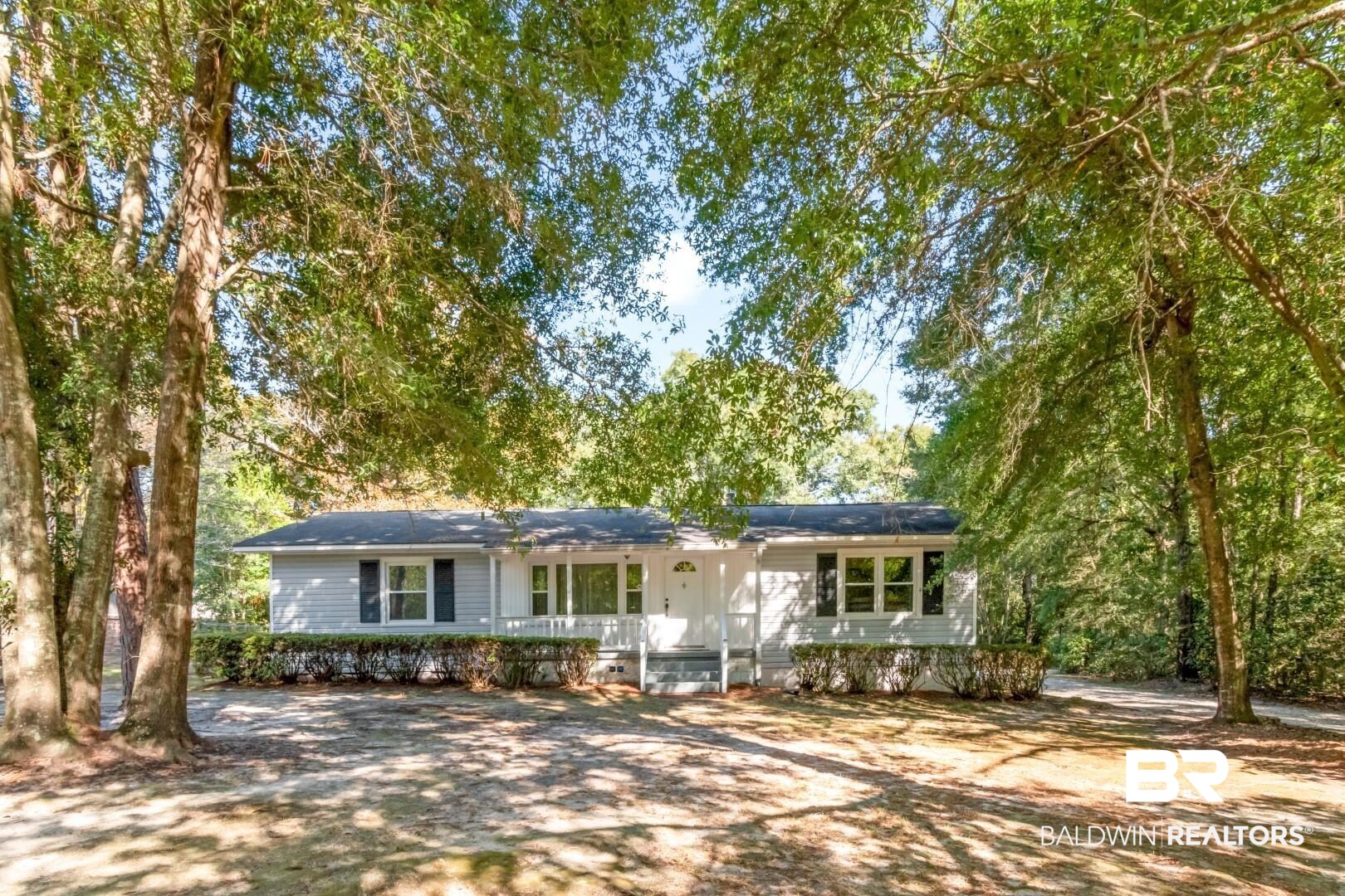 1321 Rainbow Drive West Mobile, AL 36693 - Photo 3 of 48 Ranch-style home featuring a wooden deck