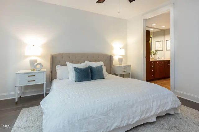 a bedroom with bed and window