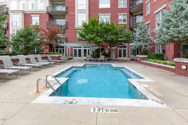 a view of a building with a swimming pool