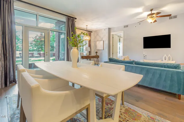 a view of living room with furniture and flat screen tv